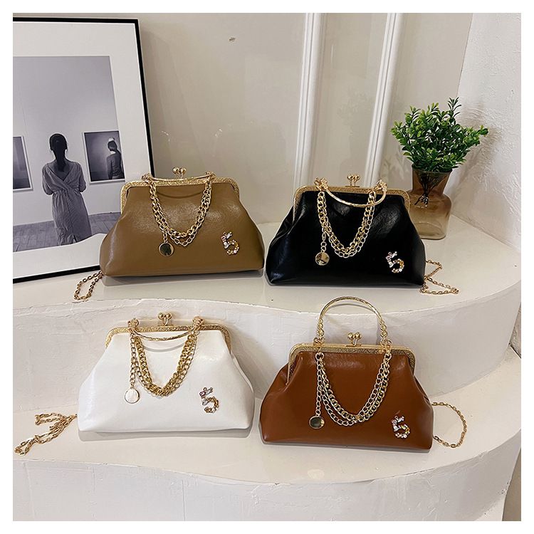 Damen 2023 neue goldene Mundtasche, trendige Modekette, One-Shoulder-Handtasche, Abendessentasche_voghion.com