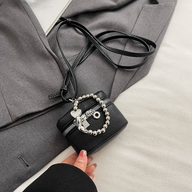Bolso de mano premium 2025, nuevo, versátil y de moda, con cremallera, bandolera, minibolso decorativo con auriculares para mujer_voghion.com