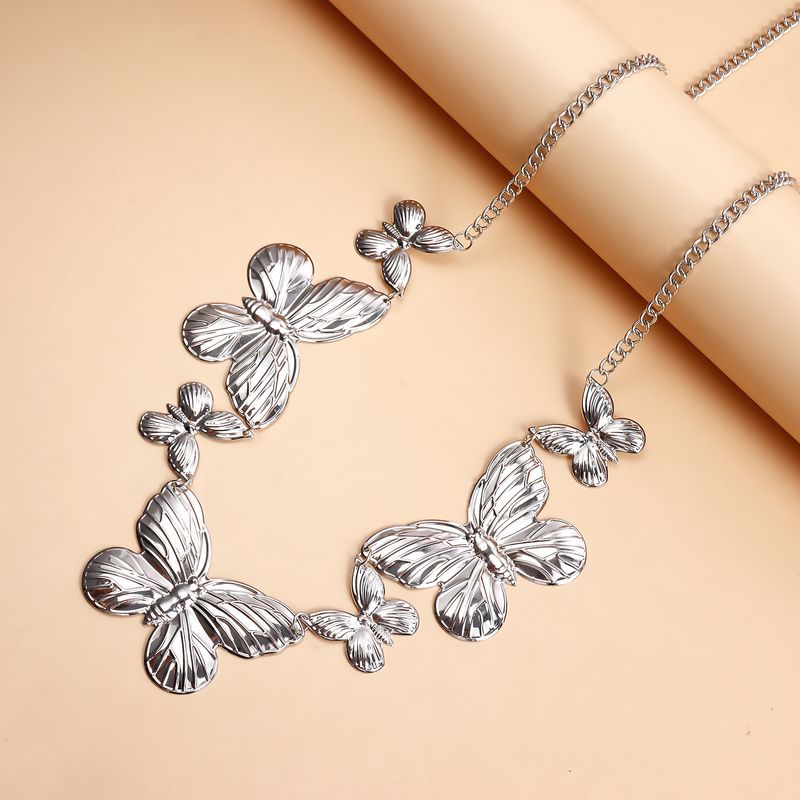 Biquíni de lazer com listras exageradas e corrente de cintura de borboleta, joia transfronteiriça europeia para primavera e verão, corrente de corpo de metal criativa para mulheres_voghion.com