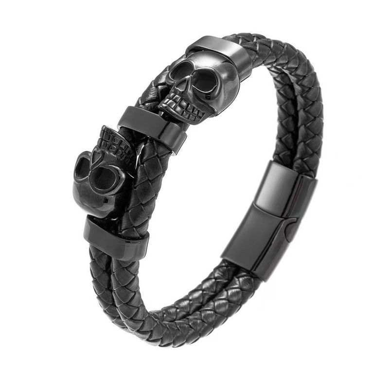 Bracciale da uomo in pelle intrecciata, stile punk scuro, fatto a mano, con teschio_voghion.com