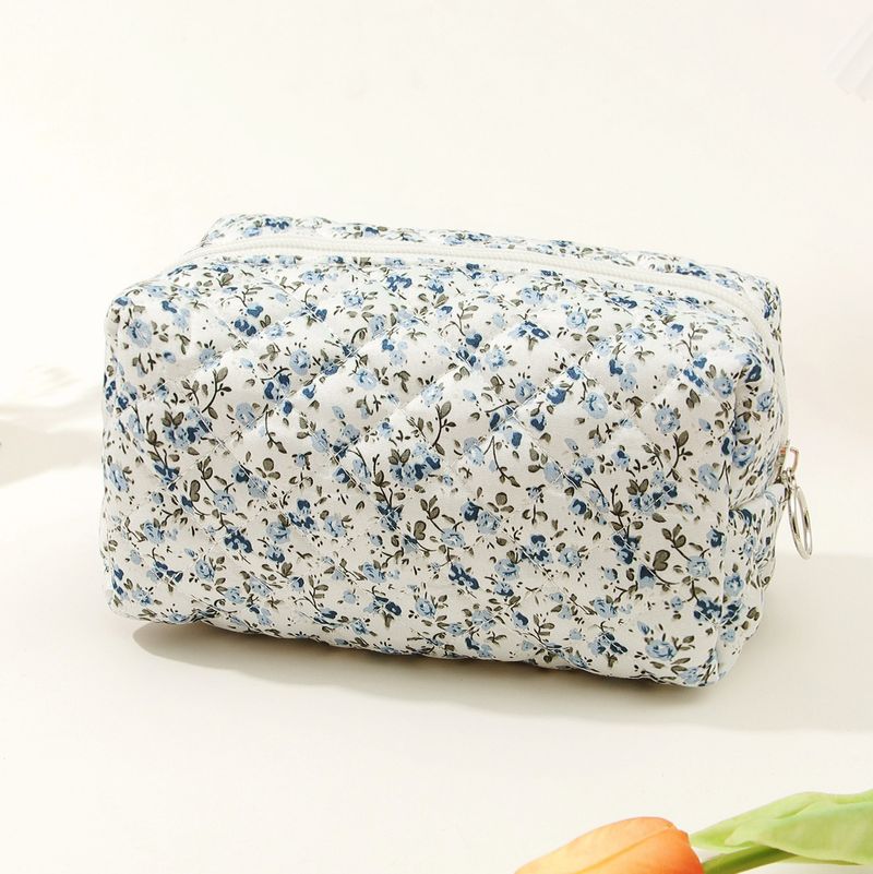 Borsa cosmetica in cotone con motivo floreale, piccola, trapuntata, da viaggio, in cotone, con interno antivento_voghion.com