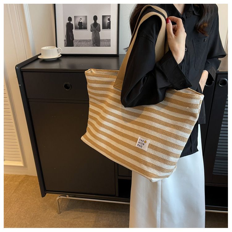2024 New Spring/summer Popular Simple Shoulder Bag Commuter Handheld Canvas Tote Bag Casual Large Capacity Bag for Women_voghion.com