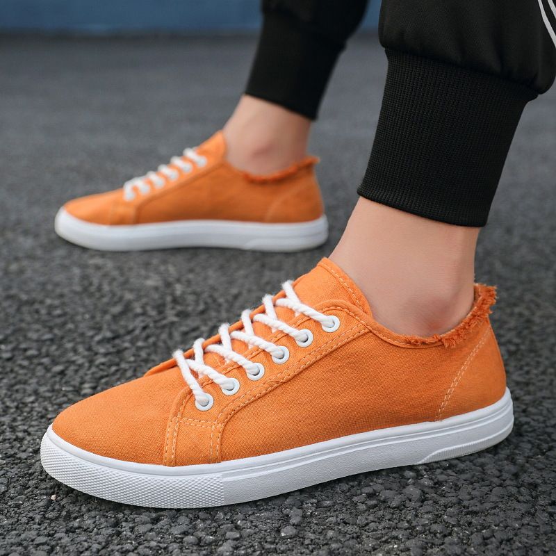 Scarpe da uomo in tela, scarpe bianche basse con suola morbida, alla moda e casual, con un solo piede, versione coreana per studenti, alla moda._voghion.com