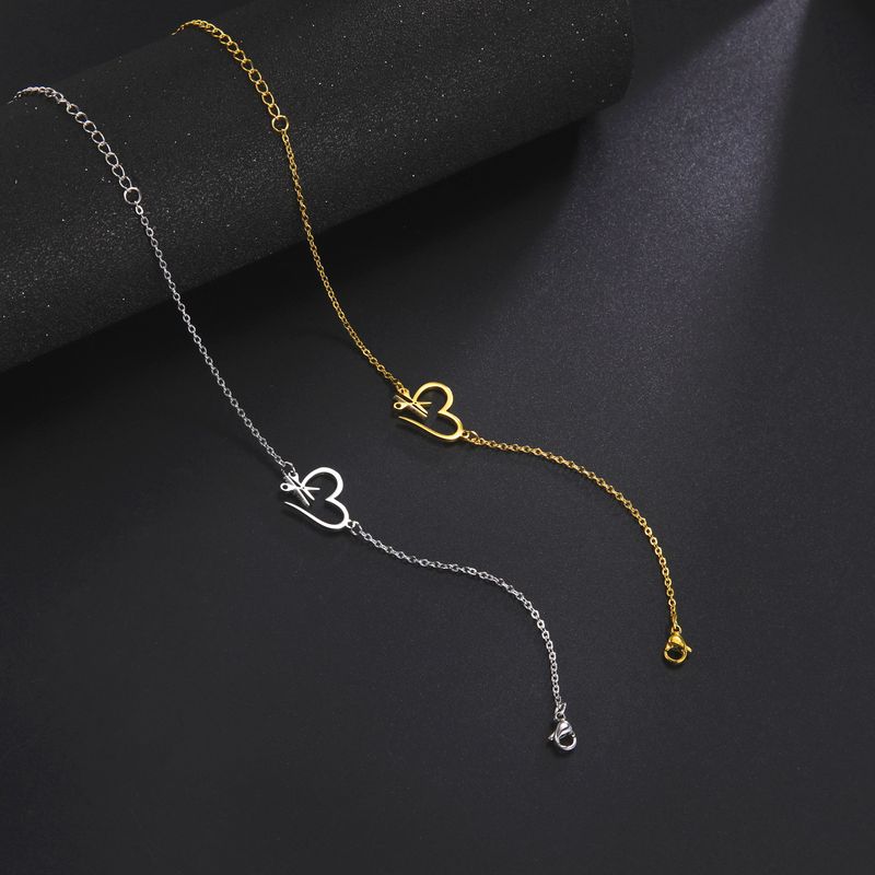 Stainless steel bracelet creative design sense of love hair tool pendant bracelet jewelry_voghion.com