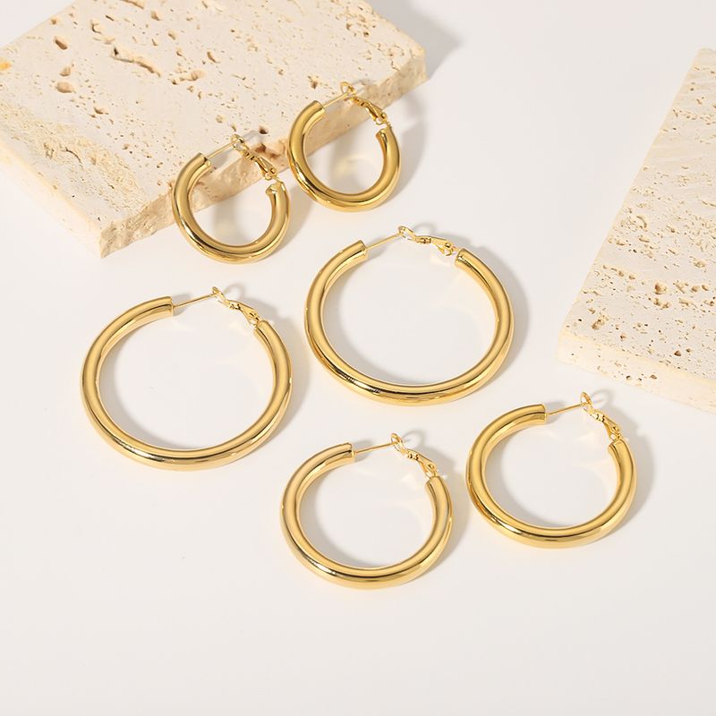 Hip Hop Style Simple Round Stainless Steel Gold-Plated Hollow Hoop Earrings Set_voghion.com