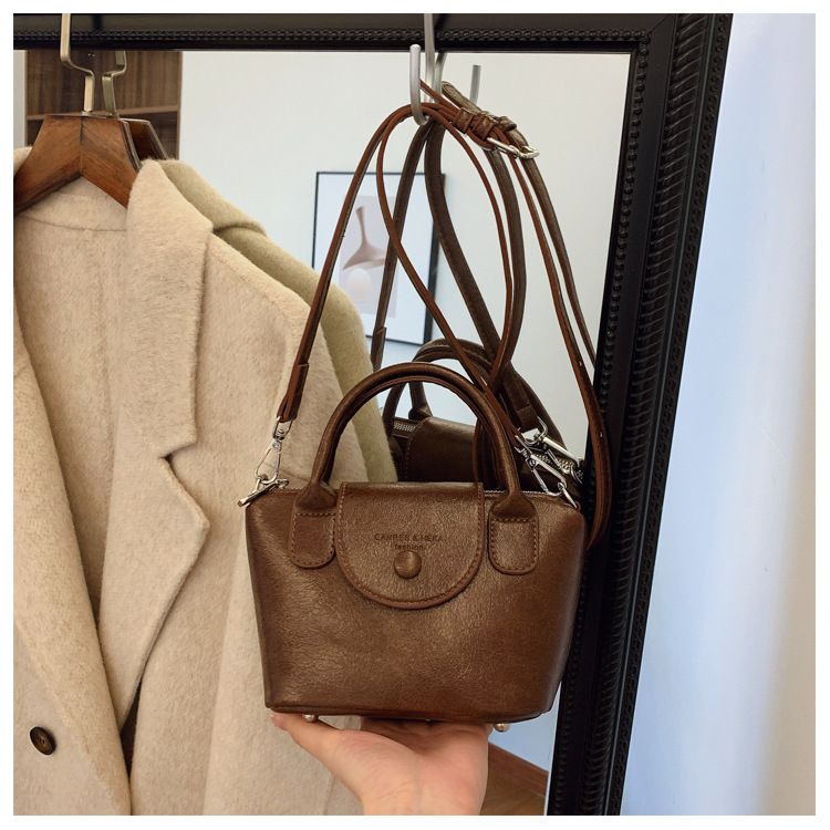 Hih end pleated texture handba for women 2024 niche desin draon bas Xian commutin crossbody versatile shoulder_voghion.com