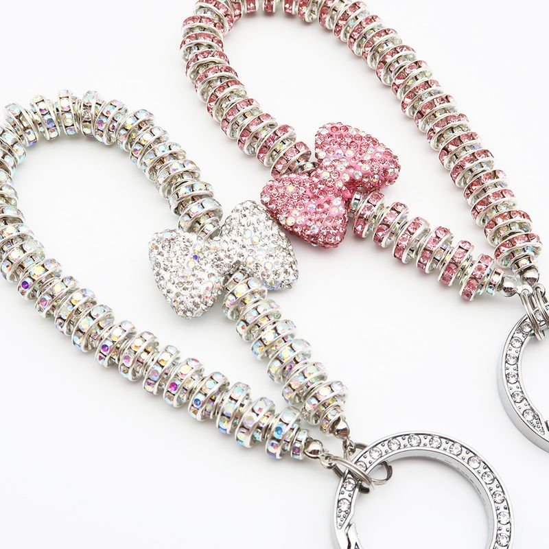 Dames licht luxe klei vol diamanten strik sleutelhanger anti-verlies diamanten ring sleutelhanger armband diamanten mobiele telefoon hanger_voghion.com