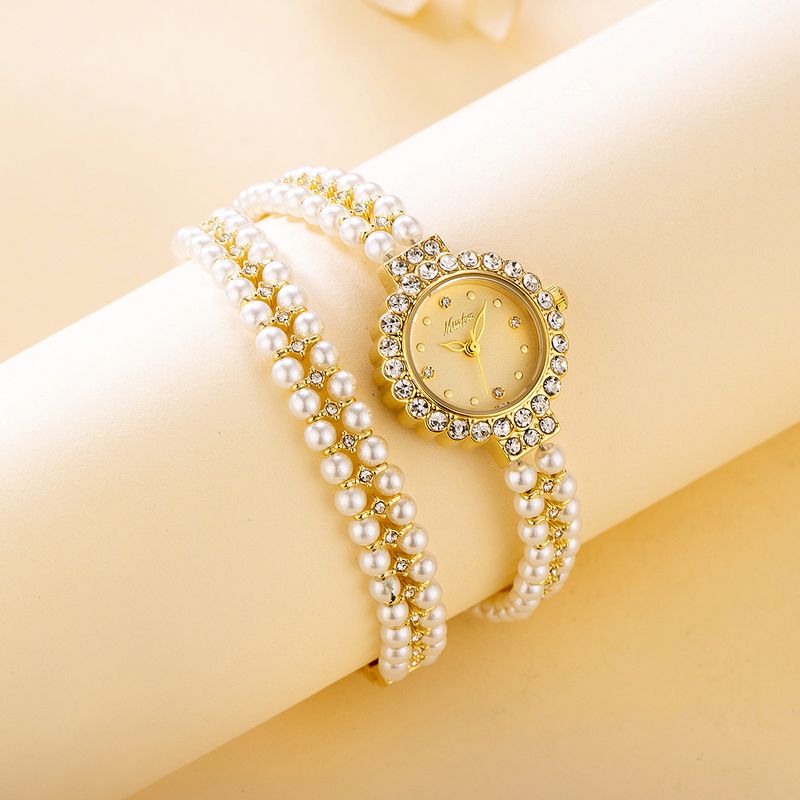 Romantische Temperament Damenuhr Diamant High-End Nischenwicklung Perlenarmband Quarzuhr_voghion.com