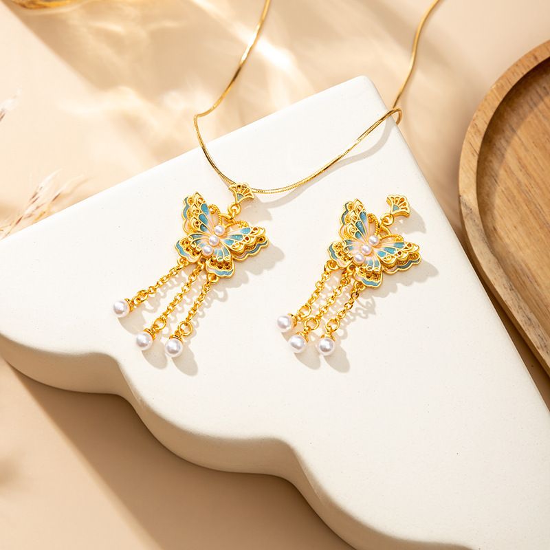Nuovo Youmeng farfalla smalto farfalla ciondolo sabbia oro perla gioielli lunga durata collana clavicola donne_voghion.com