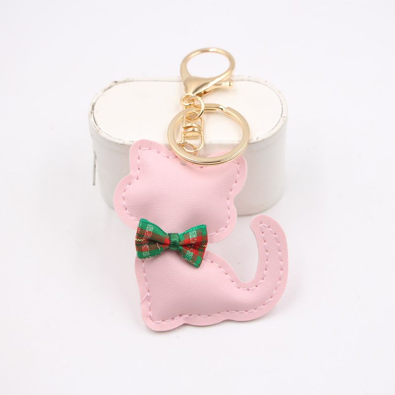 Nuovo ciondolo portachiavi in pelle a forma di papillon con gatto, accessorio per zaino, portafoglio_voghion.com