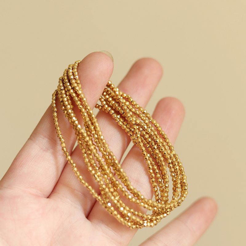 Bracelet élastique mini boule d'or en perles laser, aucune limite de taille de poignet, femmes à la mode, polyvalent et haut de gamme_voghion.com