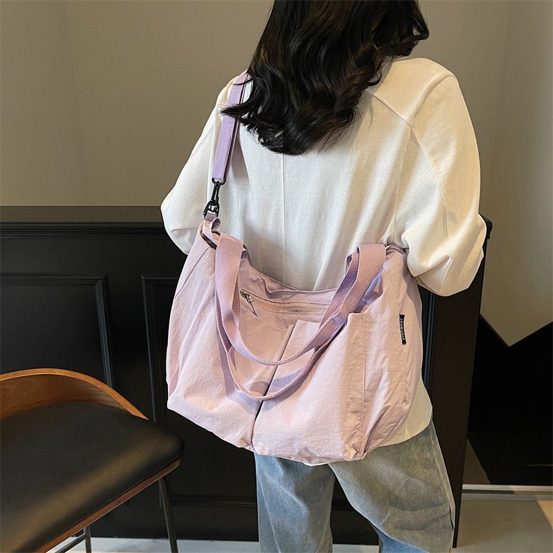 Borsa a tracolla grande e capiente in tela da donna, modello Dumpling, modello 2025, semplice e alla moda, in vendita a poco prezzo_voghion.com