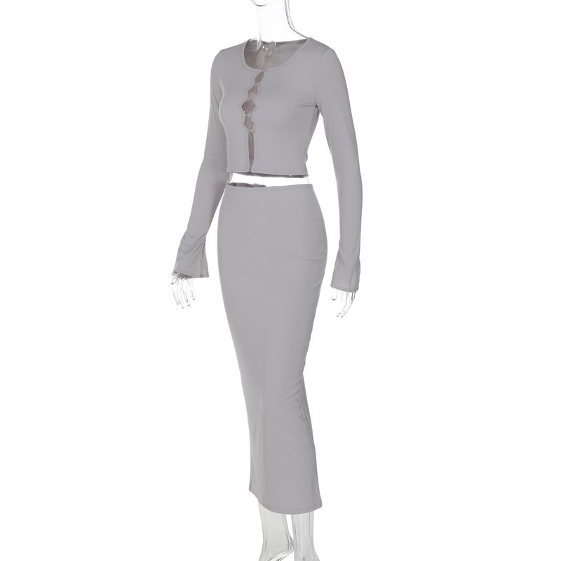 Abbigliamento donna autunno e inverno 2024 nuova moda cardigan bottoni ombelico esposto top gonna slim fit set all'ingrosso_voghion.com