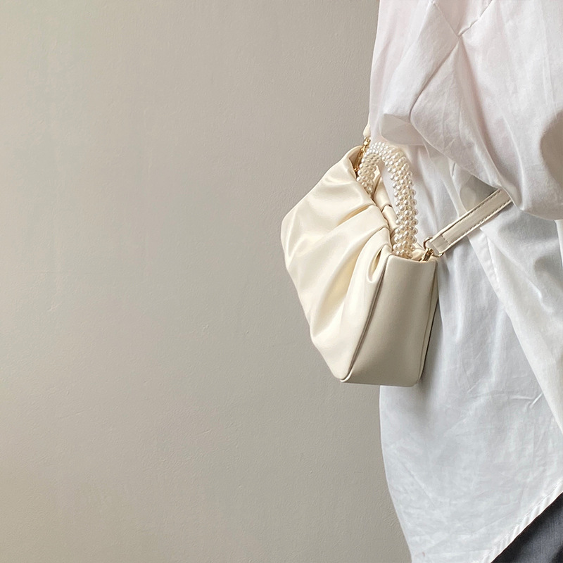 2024 Mini borsa a tracolla singola a spalla singola per telefono cellulare piegata alla moda da donna piccola perla_voghion.com