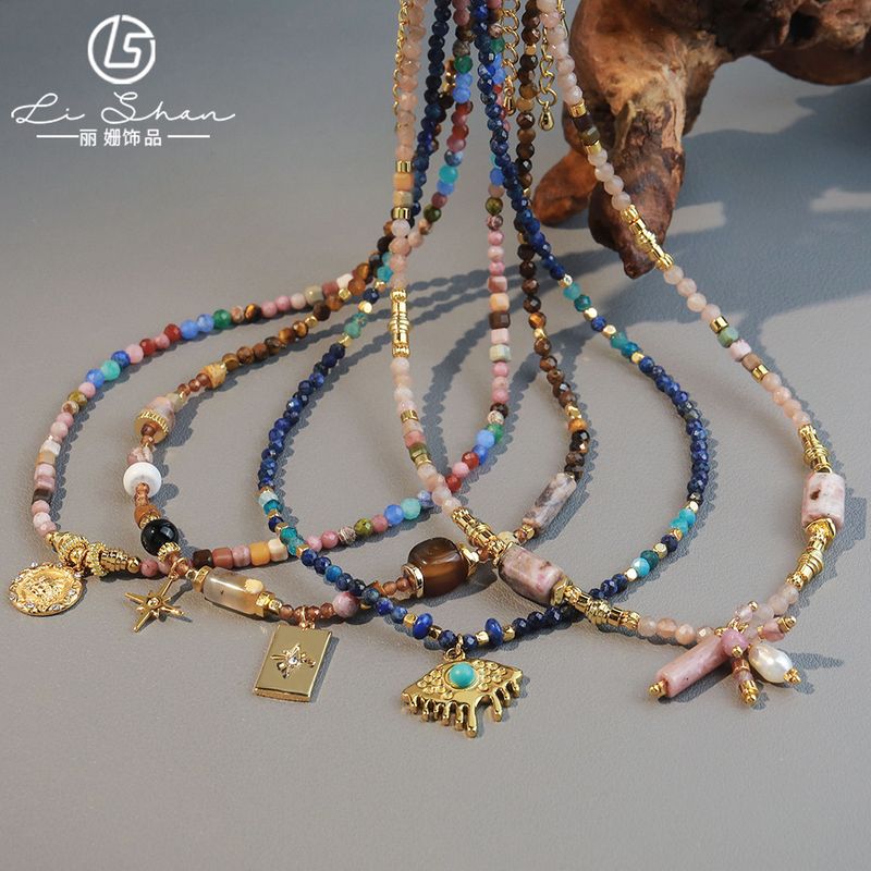 Nuova collana bohémien in pietra naturale colorata con design di nicchia e ciondolo a forma di occhio di demone di alta qualità con catena per clavicola_voghion.com