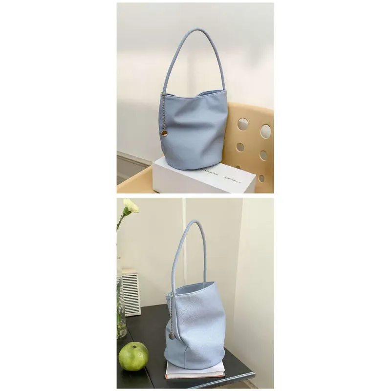 Summer New Soft Leather Bucket Handheld Niche Versatile Commuter Underarm Large Capacity Cylinder Shoulder Bag For Women_voghion.com