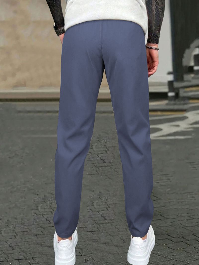 Pantaloni casual slim fit da uomo - Tinta unita, design a nove punti, dettaglio etichetta in pelle, comodi pantaloni con tasche_voghion.com