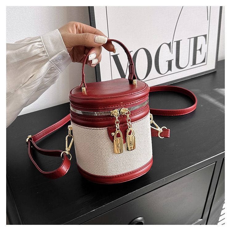 2024 New Retro Bucket Bag for Women's Handheld Fashion Contrast Color Cylinder Bag with High Appearance and Exquisite One Shoulder Crossbody Bag_voghion.com