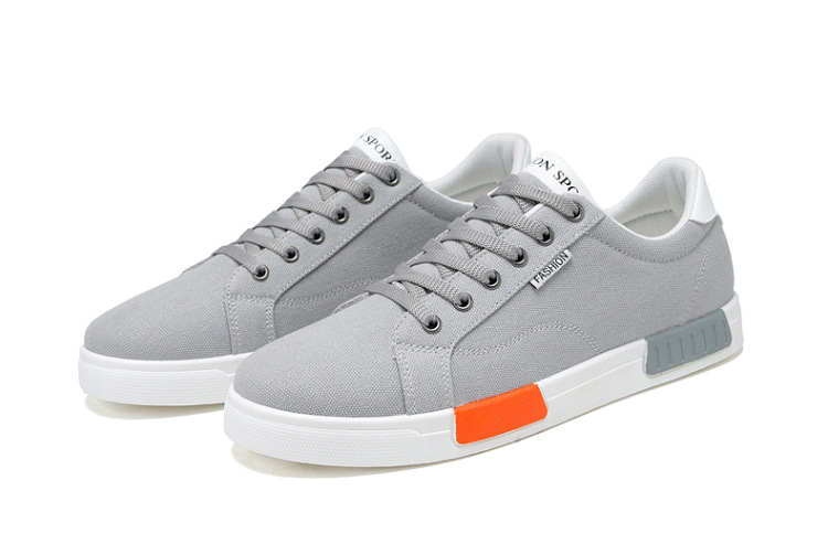 2024 nuove scarpe di tela basse da uomo in stile coreano scarpe da studente alla moda per giovani produttori di scarpe casual da uomo all'ingrosso_voghion.com
