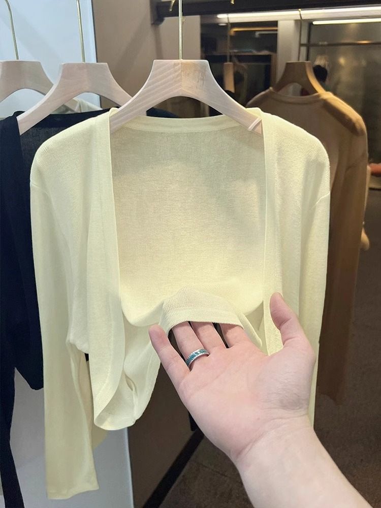 Gonna canotta estiva da donna in maglia di seta ghiacciata corta e tinta unita con protezione solare, abbinata a una giacca in garza sottile._voghion.com