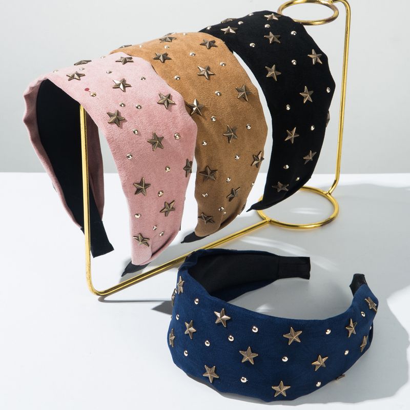 Fasce per capelli a forma di stella con design di nicchia per la primavera e l'estate 2025, alla moda e delicate_voghion.com