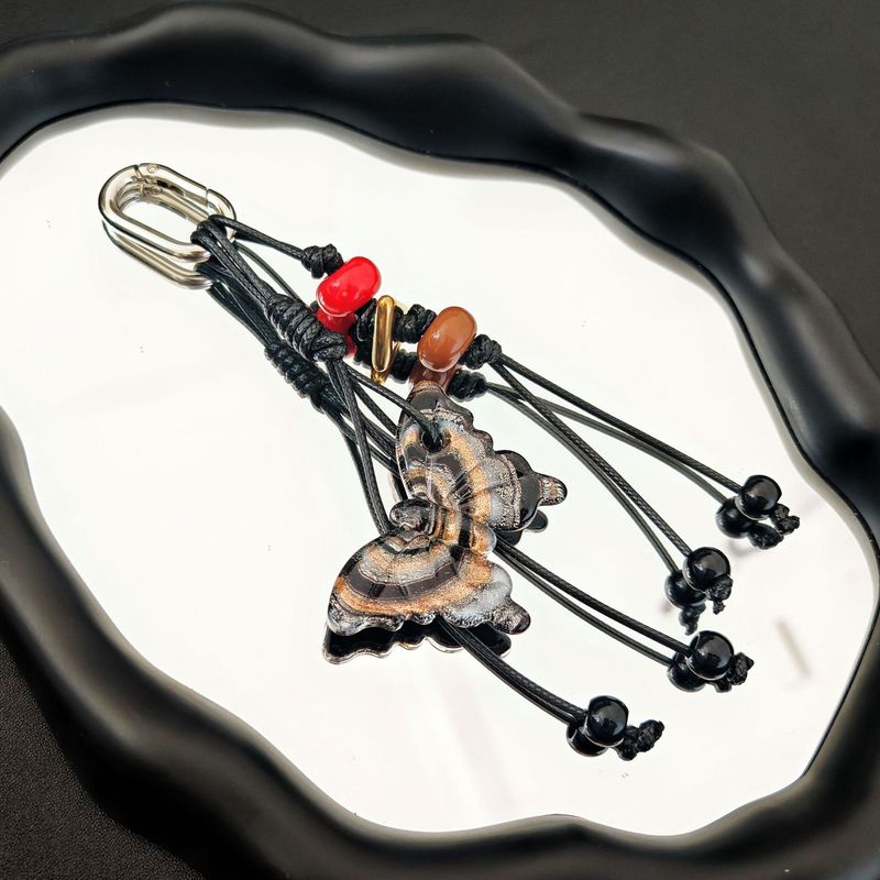 Ciondolo per borsa a forma di farfalla, portachiavi con nappa alla moda, ciondolo per borsa in corda intrecciata con perline di vetro_voghion.com