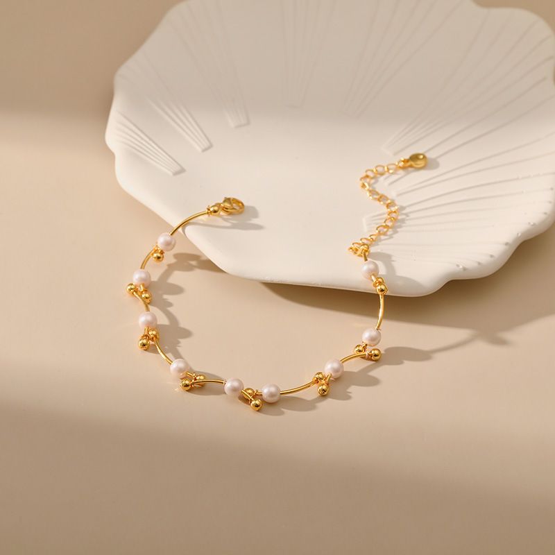 Perlenarmband Persönlichkeit geknotete goldene runde Perlen Kupferrohrdesign Handschnur Transferperlen Glücksbringer Handschmuck mit K Echtgold überzogen_voghion.com