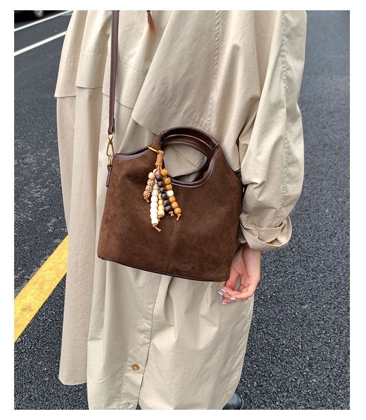 Borsa a secchiello con tracolla singola versatile in pelle scamosciata da donna, nuova moda 2025, borsa a mano Melad_voghion.com