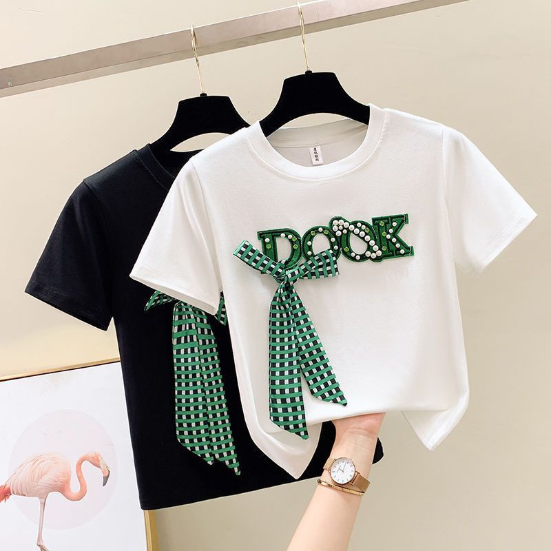 Roupas femininas nova camiseta de manga curta com laço frisado e saia jeans com borda crua dividida_voghion.com