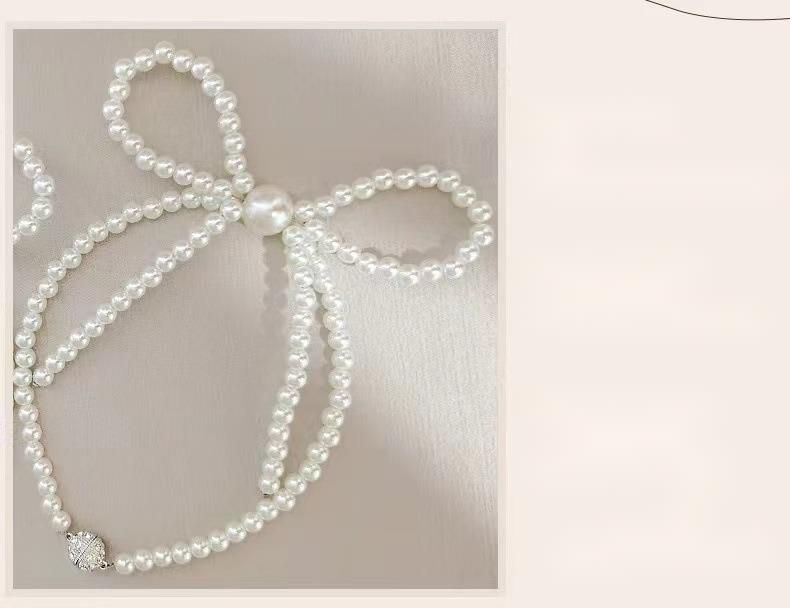 Creative New Simple Pearl Bow Curtain Tie No-Drill Magnetic Buckle Light Luxury_voghion.com