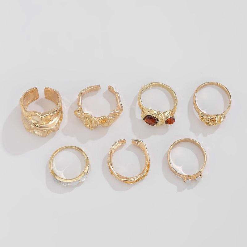 Set di anelli placcati in oro per donna, 7 pezzi di anelli con pietre preziose e texture di ispirazione vintage, collezione di gioielli impilabili in stile boho audace_voghion.com
