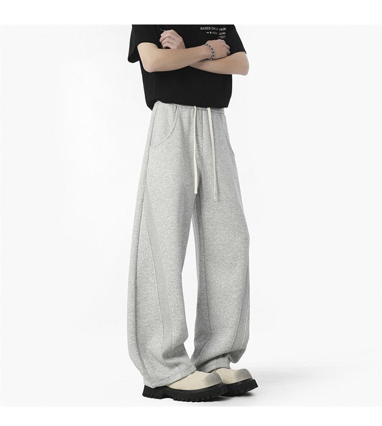 Jogginghose im dekonstruierten, einfarbigen Herrenstil – Cleanfit, lockere, gerade geschnittene Freizeit-Sweathose für Streetwear und den Alltag_voghion.com