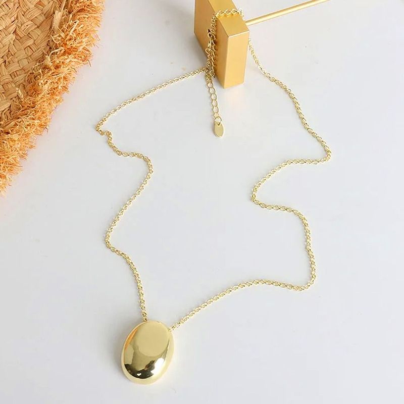 2025 Women Fashion Brand new matte metal oval pendant, geometric long women's sweater luxurious and charming fine necklace, artificial_voghion.com