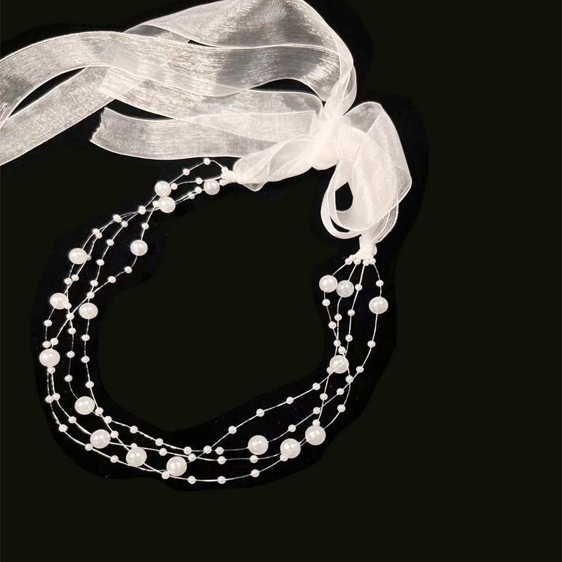 La bellissima e minimalista collana multistrato di perle in stile coreano di Erxun con fascia per capelli trasparente personalizzata_voghion.com