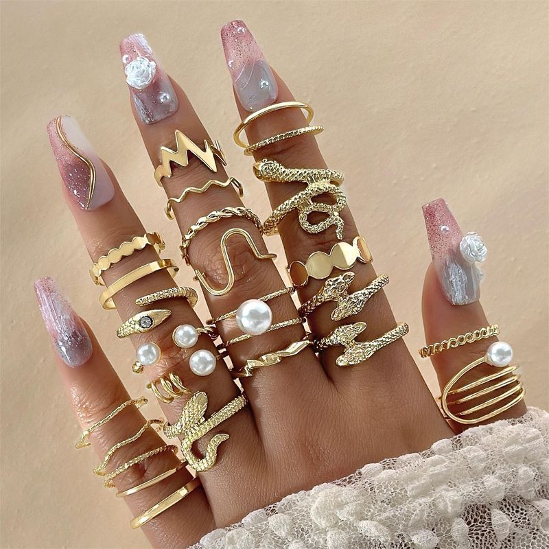 Set di anelli impilabili per nocche con occhio di serpente, punk vintage, farfalla, fiore e luna_voghion.com
