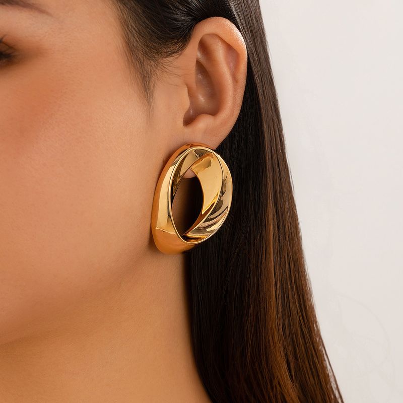 Personality metal geometric texture hollow earrings female irregular twisted glossy earrings earrings_voghion.com