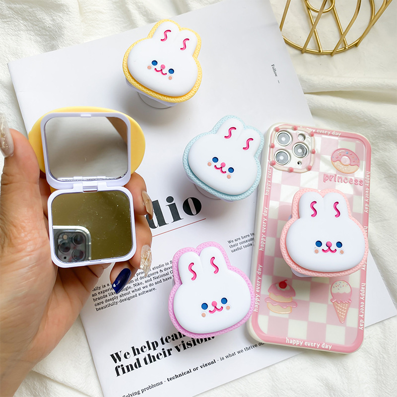 Supporto per airbag per cellulare a forma di coniglio con simpatico cartone animato, incollato con specchio da trucco portatile da tavolo, supporto stabile per nicchia_voghion.com