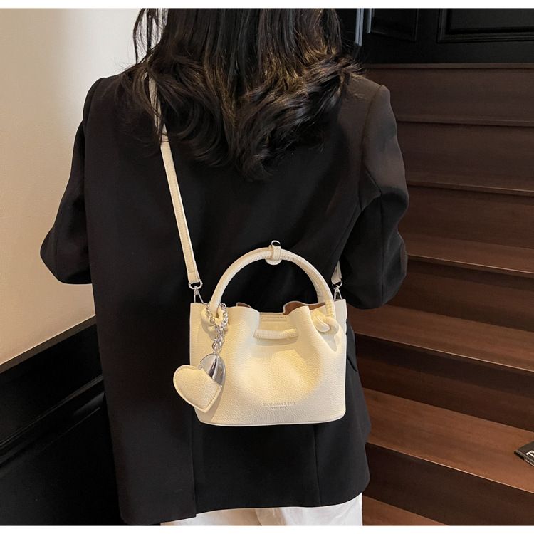 Spring New Personalized Solid Color Folding Drawstring Beaded Bow Shoulder Crossbody Bag_voghion.com