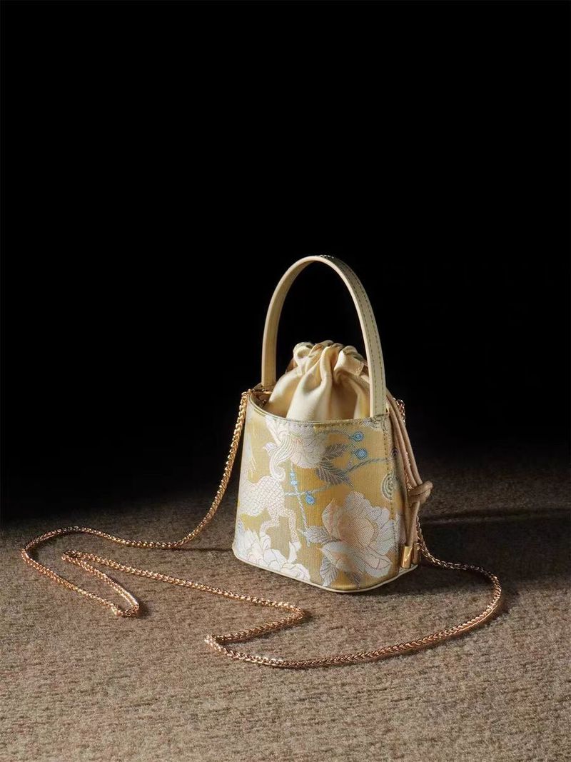 Borsa a secchiello portatile da donna in stile nazionale cinese Kirin Peony, mini 2025_voghion.com