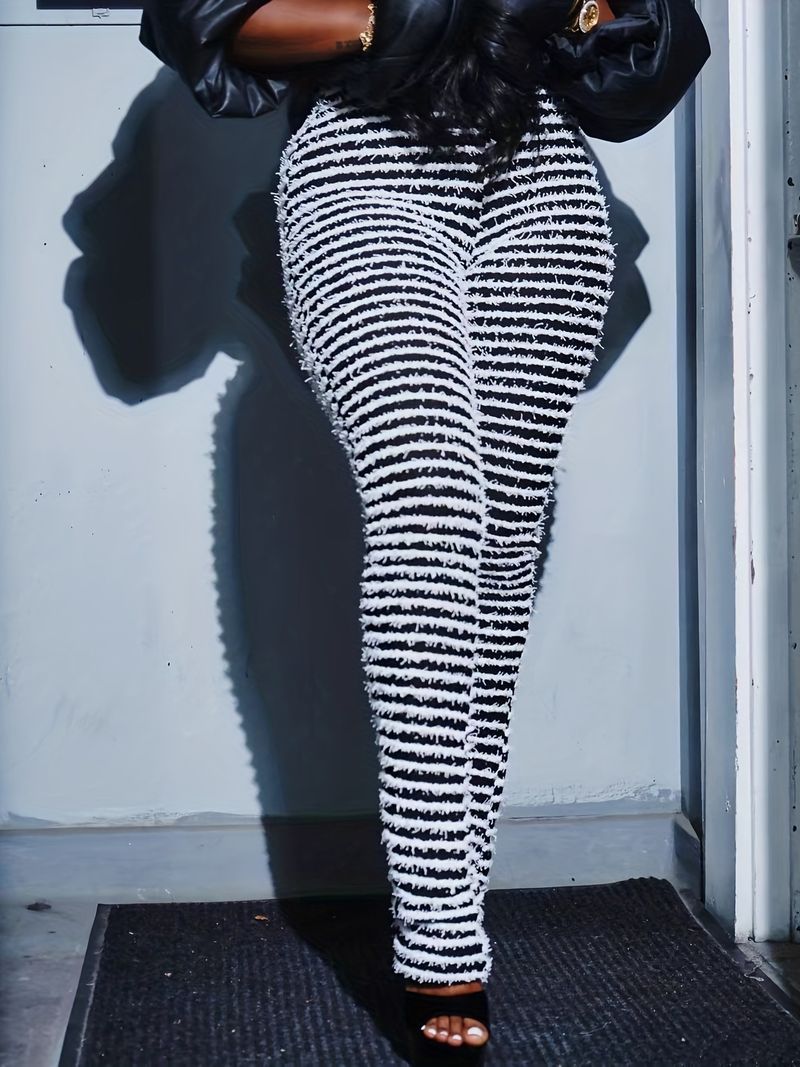 Pantaloni slim da donna a vita alta in maglia a righe_voghion.com