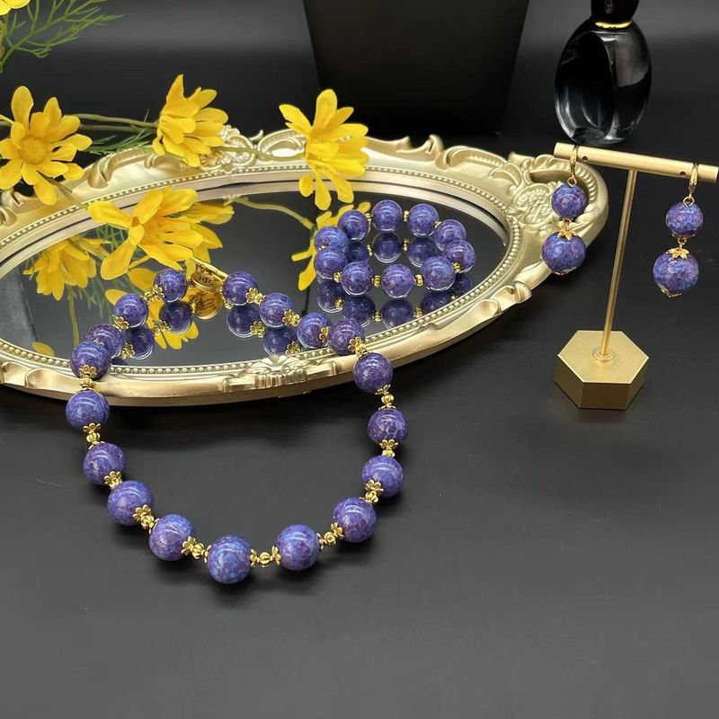 Ensemble collier, boucles d'oreilles et bracelet en perles de peau de grenouille violettes en verre ancien fait à la main_voghion.com