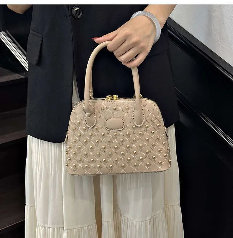Fashion Designer Shell Bags For Women Elegant Rivet Handbag Versatile Large Capacity Shoulder Crossbody Bag_voghion.com