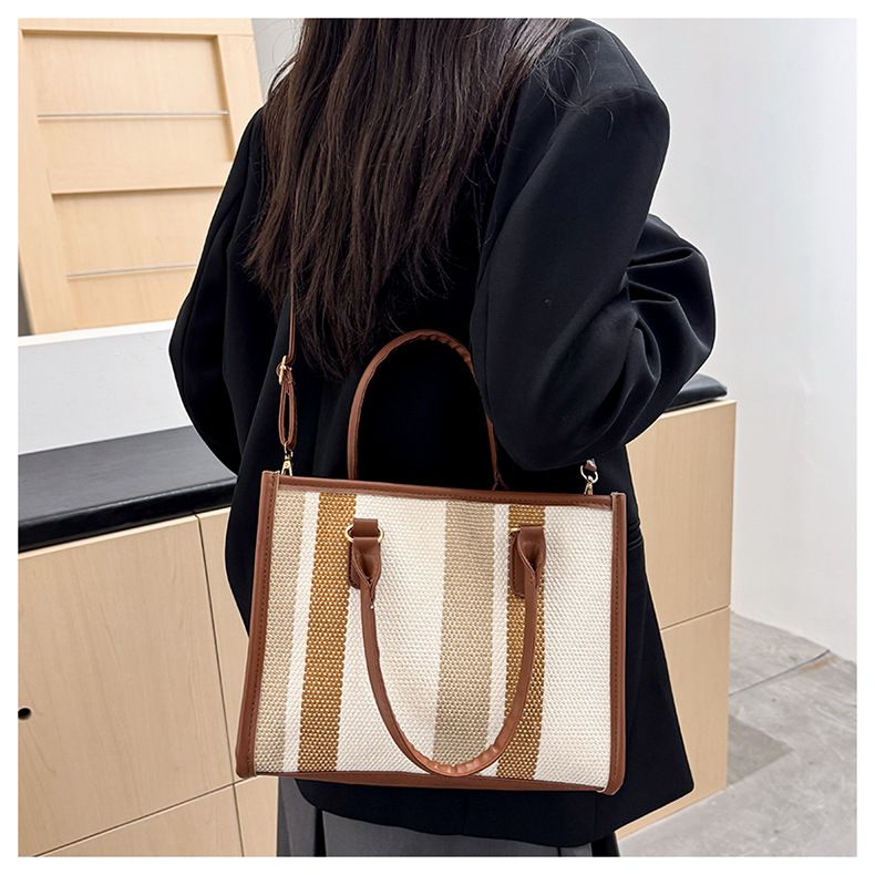 Large Capacity Handheld Tote For Women 2025 New European And American Trendy Canvas Color-Block Striped Single Shoulder_voghion.com