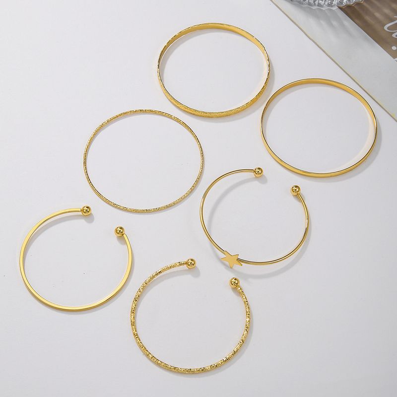 Retro Personality Exaggerated Open Five Pointed Star Bracelet Set 6 Gold Glossy Irregular Bracelet Cuff Bracelet_voghion.com