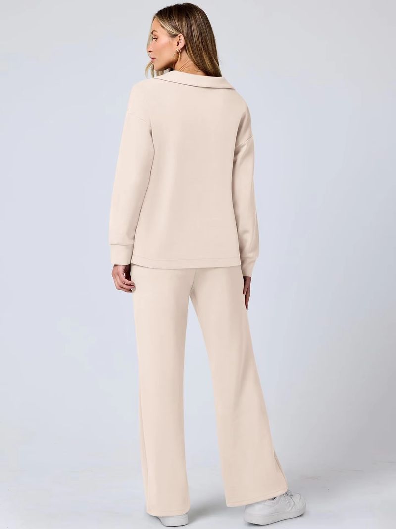 Completo due pezzi da donna, top a maniche lunghe con scollo a V e coulisse, elastico in vita e pantaloni svasati._voghion.com