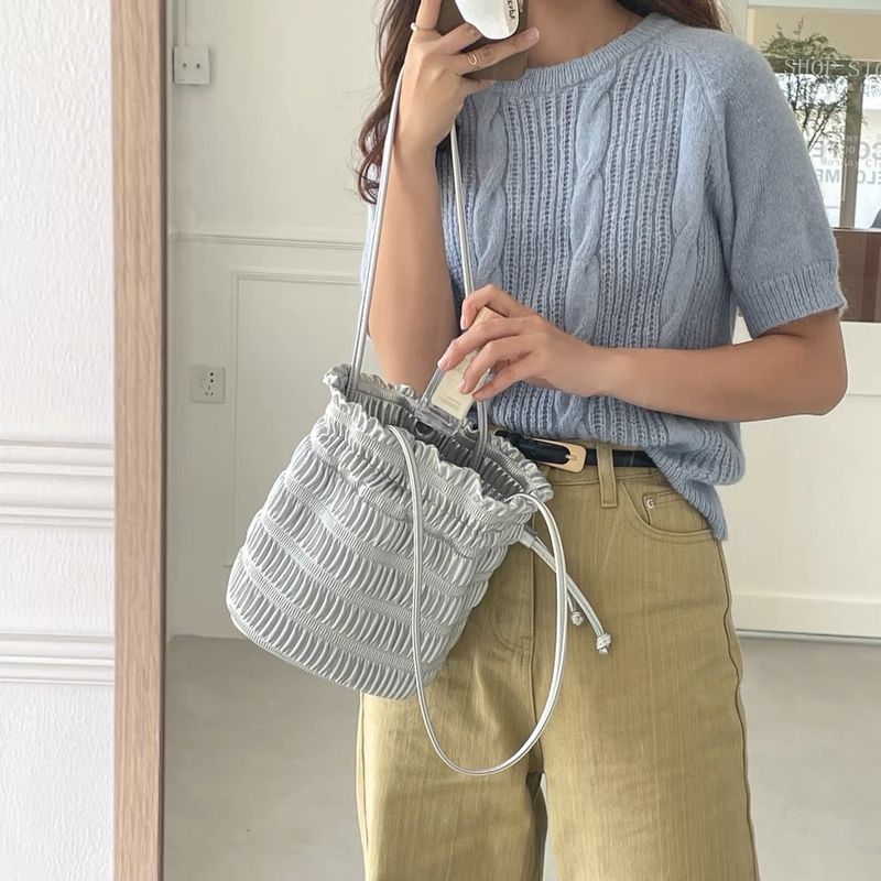 Bag Korean bucket niche design bag, fashionable pleated soft leather drawstring, one shoulder, gentle silver underarm_voghion.com