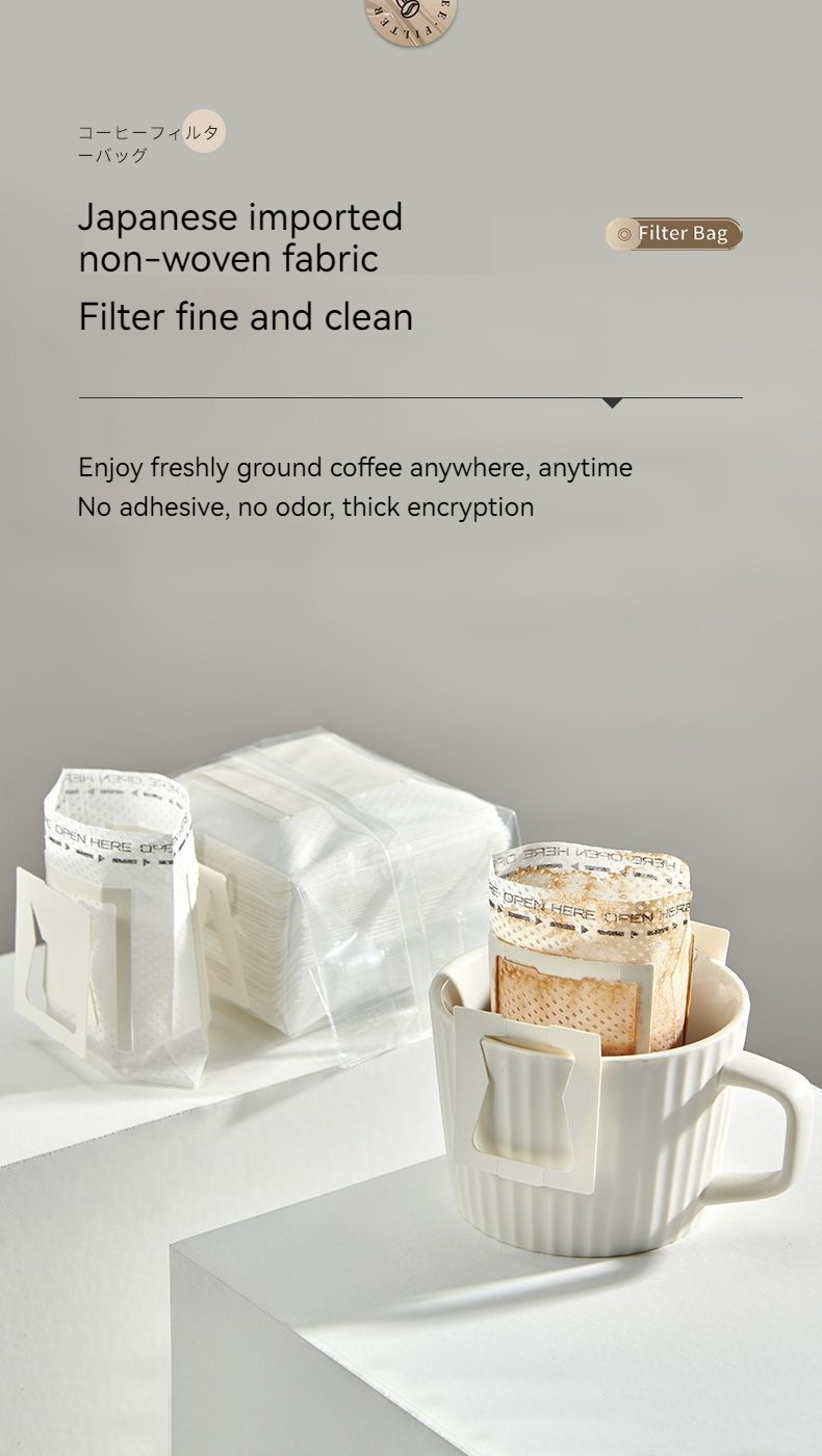 Sacchetto filtro per caffè usa e getta in carta in polvere prodotta a mano, appeso allo schermo dell'orecchio_voghion.com