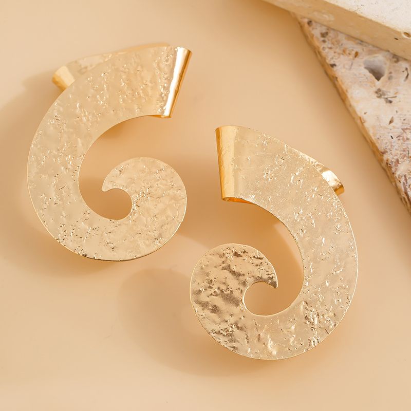 Personality metal geometric texture hollow earrings female irregular twisted glossy earrings earrings_voghion.com