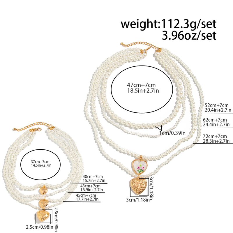 Collier de perles de luxe léger à la mode avec pendentif en forme de cœur en métal_voghion.com