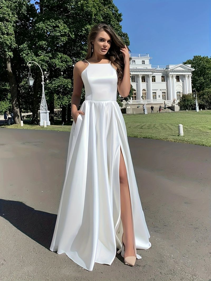 Sommerkleid in Übergröße, ärmelloses Maxikleid mit V-Ausschnitt und Schlitz, elegantes, fließendes Design, atmungsaktives Polyestergewebe – weißes, lässiges Boho-Chic-Kleid_voghion.com